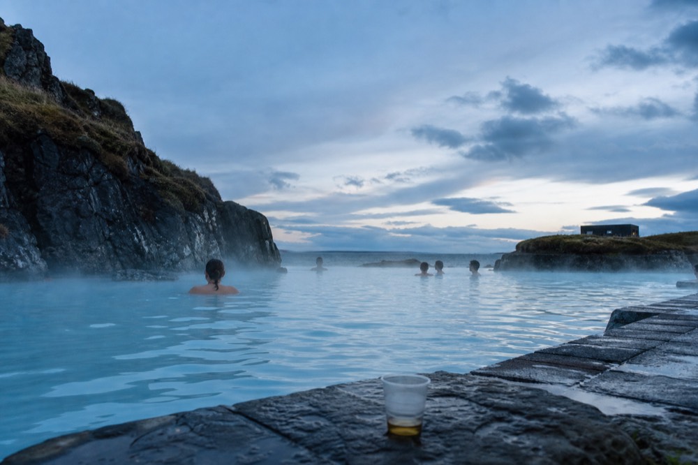 Warm lagoon water steaming against a cold evening sky