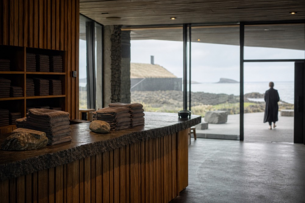 Reception desk and warm interior of a spa building